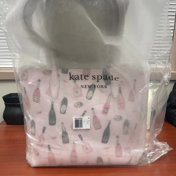 Beautiful Kate Spade Arch Champagne Tote (reversible)
